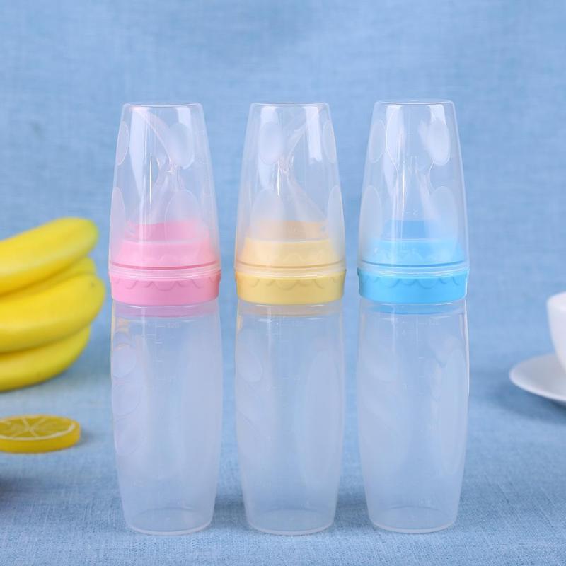 Squeeze baby feeding spoon - Bright Cubb